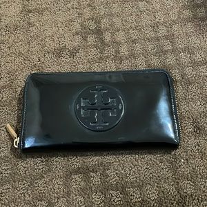 Black patent leather Tory Burch wallet with gold finishing